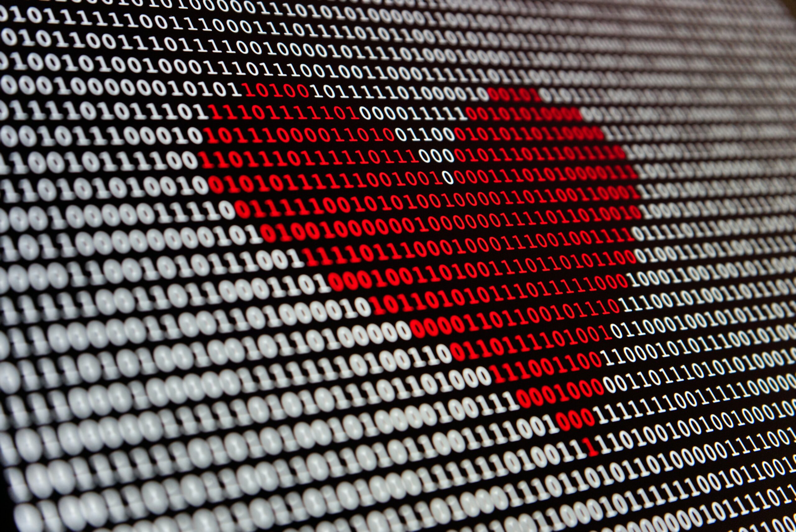 Red heart on data or bits and bytes